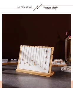 Bamboo necklace display board with 12 slots and white velvet lining for jewelry organizing