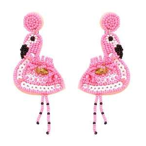 Handmade pink beaded flamingo drop earrings with gold gemstones on white background