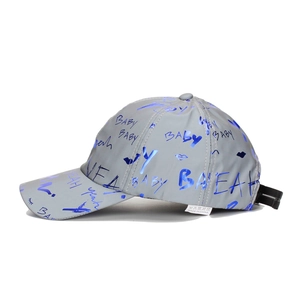 Grey reflective baseball cap with blue graffiti print and street style embroidery