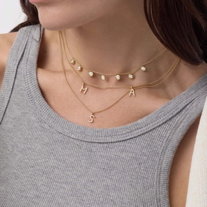 Ensemble de colliers superposés en acier inoxydable doré avec zircons et pendentifs