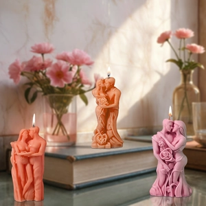 Detailed view of abstract couple hugging silicone candle molds in pink, brown and violet