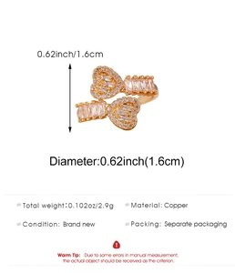 Detail view of gold-plated brass heart ring with cubic zirconia inlay specifications