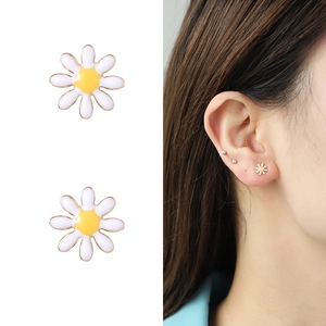 Colorful summer daisy flower stud earrings with white enamel petals and yellow center detail