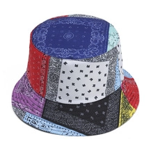 Close-up of paisley pattern patchwork on a colorful tie-dye cotton bucket hat
