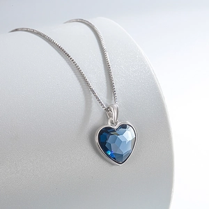 Elegant S925 sterling silver Heart of the Ocean necklace with deep blue crystal pendant