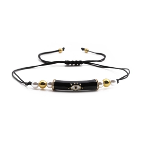 Handmade black woven Evil Eye bracelet with copper beads and imitation pearls