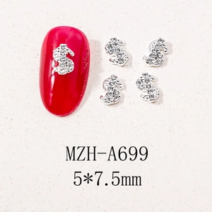 Close-up of dollar sign nail charms with silver metal and rhinestones, size 5x7.5mm