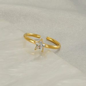 Adjustable gold stainless steel ring featuring a sparkling star-shaped zircon stone