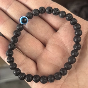 6mm natural black lava stone beaded bracelet with blue evil eye charm for men