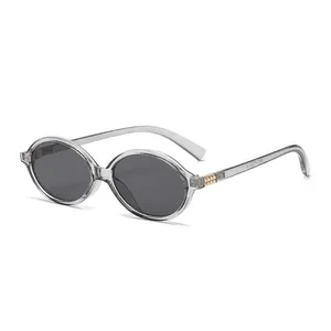 Retro oval sunglasses in transparent gray frame with dark gray lenses at 45-degree angle