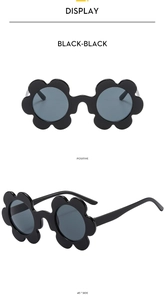 Detailed front and 45-degree side views of black flower-shaped fashion sunglasses