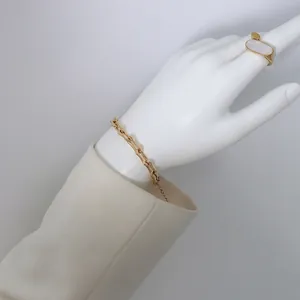 Ensemble de bijoux en titane plaqué or 18k avec chaîne bambou et bague ovale