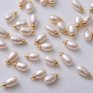 Multiple 6mm freshwater pearl teardrop charms with gold bails for DIY jewelry making