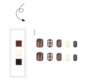 Detail view of brown and cream press-on nails with plaid patterns and wave textures