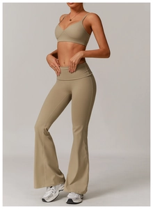 Close-up of V-neck yoga bra and flared high-waist pants in premium latte beige fabric