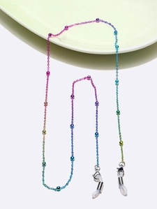 Close-up of rainbow gradient metal glasses chain with beads and non-slip silicone loops