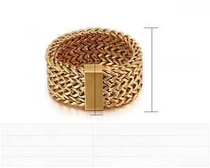 Close-up of a 12mm wide punk style woven chain ring in gold polished stainless steel