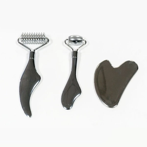 Stainless steel facial massage set with rollers and gua sha tool for skin lifting