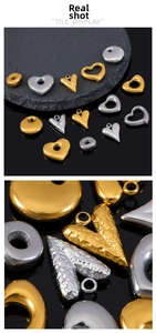 Macro detail of various stainless steel heart and bead pendants for DIY jewelry making