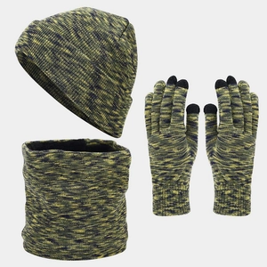 Detailed knit texture of tie-dye winter set with touchscreen gloves and neck warmer