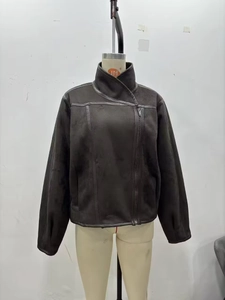 Detail of dark brown faux suede jacket with stand collar and asymmetric zipper binding