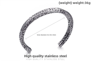 Detail view of vintage stainless steel cuff bracelet with textured patterns, 64x5mm size