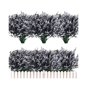 Artificial lavender bundles with frosted purple leaves in a white fence planter box