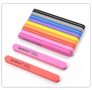 Macro detail of colorful S100/180 grit washable sponge nail files for professional manicure