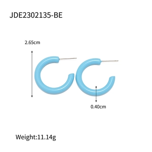 Detail view of blue C-shaped earrings showing 2.65cm height and 0.40cm thickness specifications