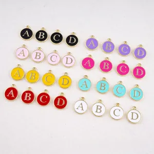 Colorful enamel letter charms in round gold alloy for DIY bracelets and jewelry making
