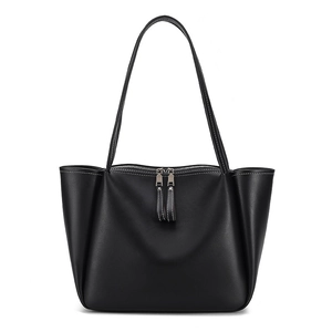 Minimalist black large capacity leather tote bag with dual shoulder straps and silver zipper