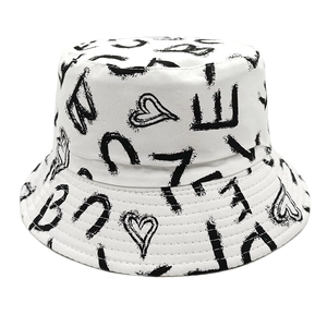 White bucket hat with black heart and letter graffiti print for sun protection
