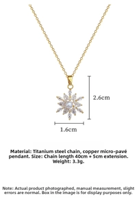 Detail of snowflake pearl pendant with zircon inlay on titanium steel chain