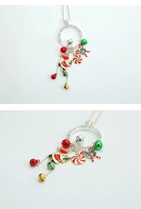 Detailed view of Christmas necklace with Santa, candy cane, and colorful jingle bell charms