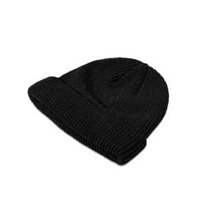 Detailed view of the fine knit texture and folded hem of this black winter beanie hat