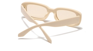 Detailed back view of retro cream narrow frame sunglasses with light brown lenses