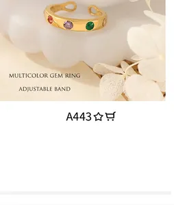 Detailed shot of an adjustable gold-plated ring set with vibrant multi-color gemstones
