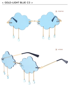 Detailed views of cloud-shaped rimless sunglasses with light blue lenses and gold tassels