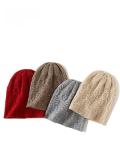Detailed knit texture of cashmere beanies in red, coffee, grey, and beige colors