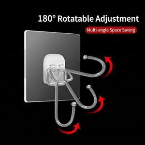 Silver rotatable wall hook with adhesive base showing 180-degree adjustment range