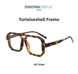 Detail view of double bridge tortoiseshell glasses frame with metal rivets at 45 degree angle