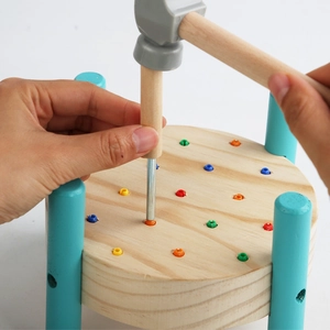 Wooden pounding bench toy with colorful pegs and mallet for hand-eye coordination training