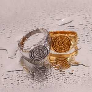 18K gold and silver stainless steel rings featuring unique fingerprint spiral pattern