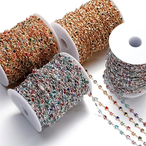 DIY colorful heart and butterfly crystal jewelry chains on white plastic spools
