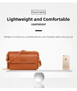 Crossbody phone bag in caramel leather showing lightweight design with three zipper layers