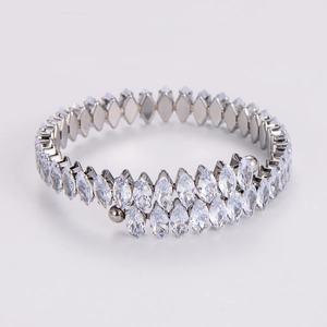 Macro view of silver wrap ring featuring double-row marquise zircon stones and metal ends