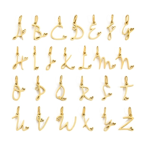 Detailed collection of 26 golden heart-shaped initial pendants on white background