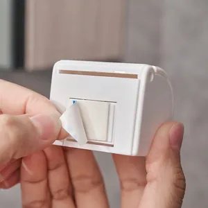 Adhesive wall-mounted razor holder for men showing the installation and peeling of back tape