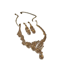Luxury gold-plated necklace and earrings set with champagne teardrop crystals for weddings