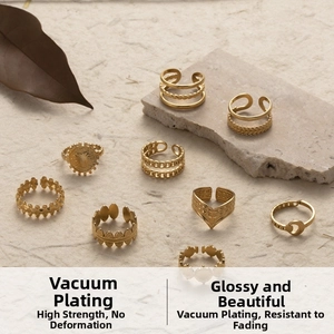 Detail of adjustable 18K gold plated stainless steel rings with celestial moon motifs